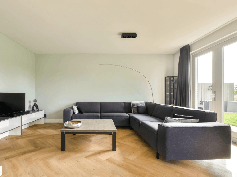 What Is Low-E Glass and How Does It Work? 1 TV in a bright theatre room