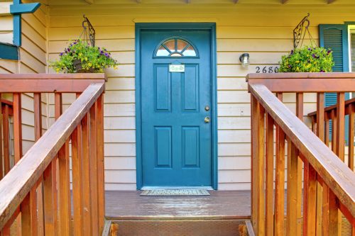 Feature front door in a teal colour.