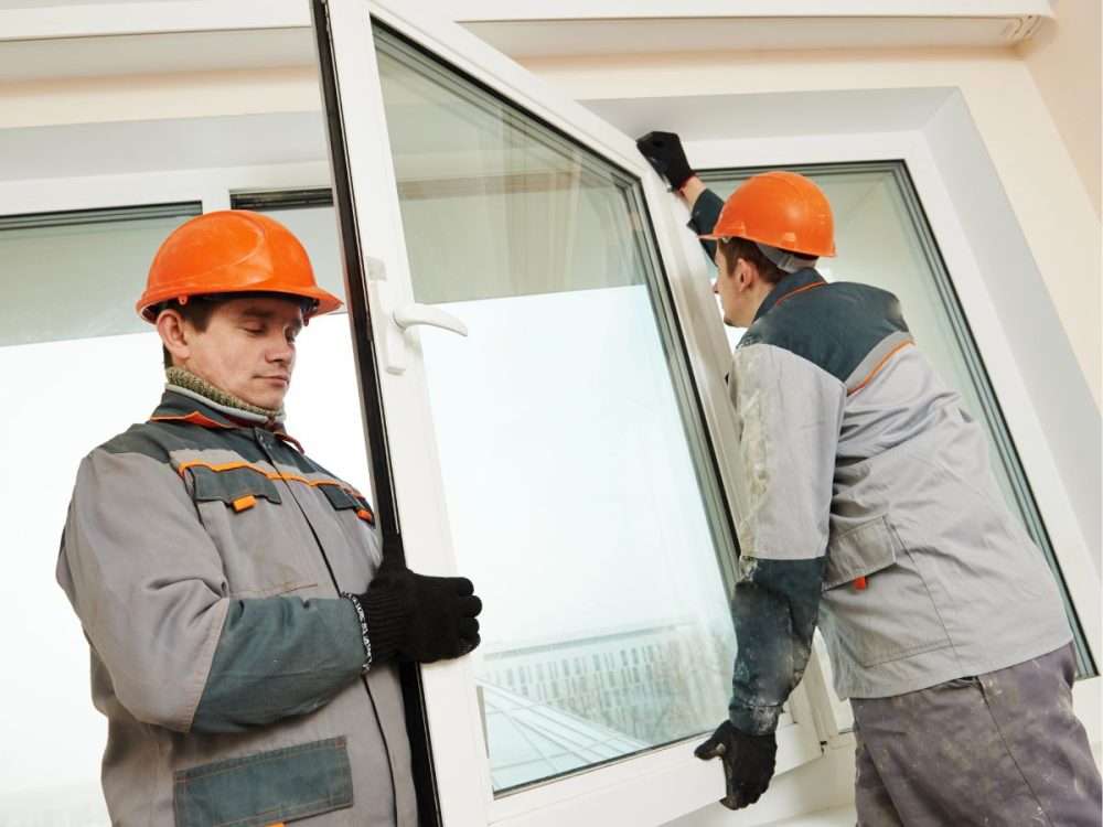 Is Strata Responsible for Windows in WA? What to Check Before Replacement 1 Window installers fitting a replacement window frame