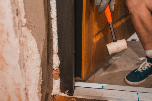 Foam being used to insulate a door