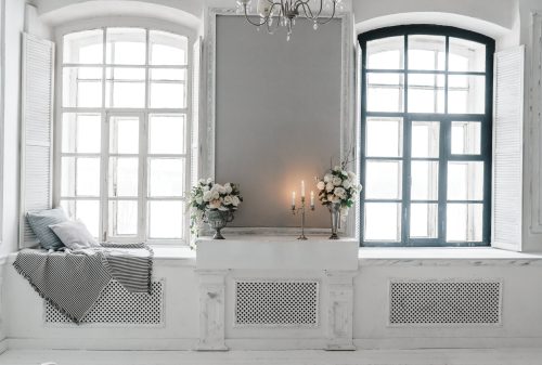 A pair of windows in a white room